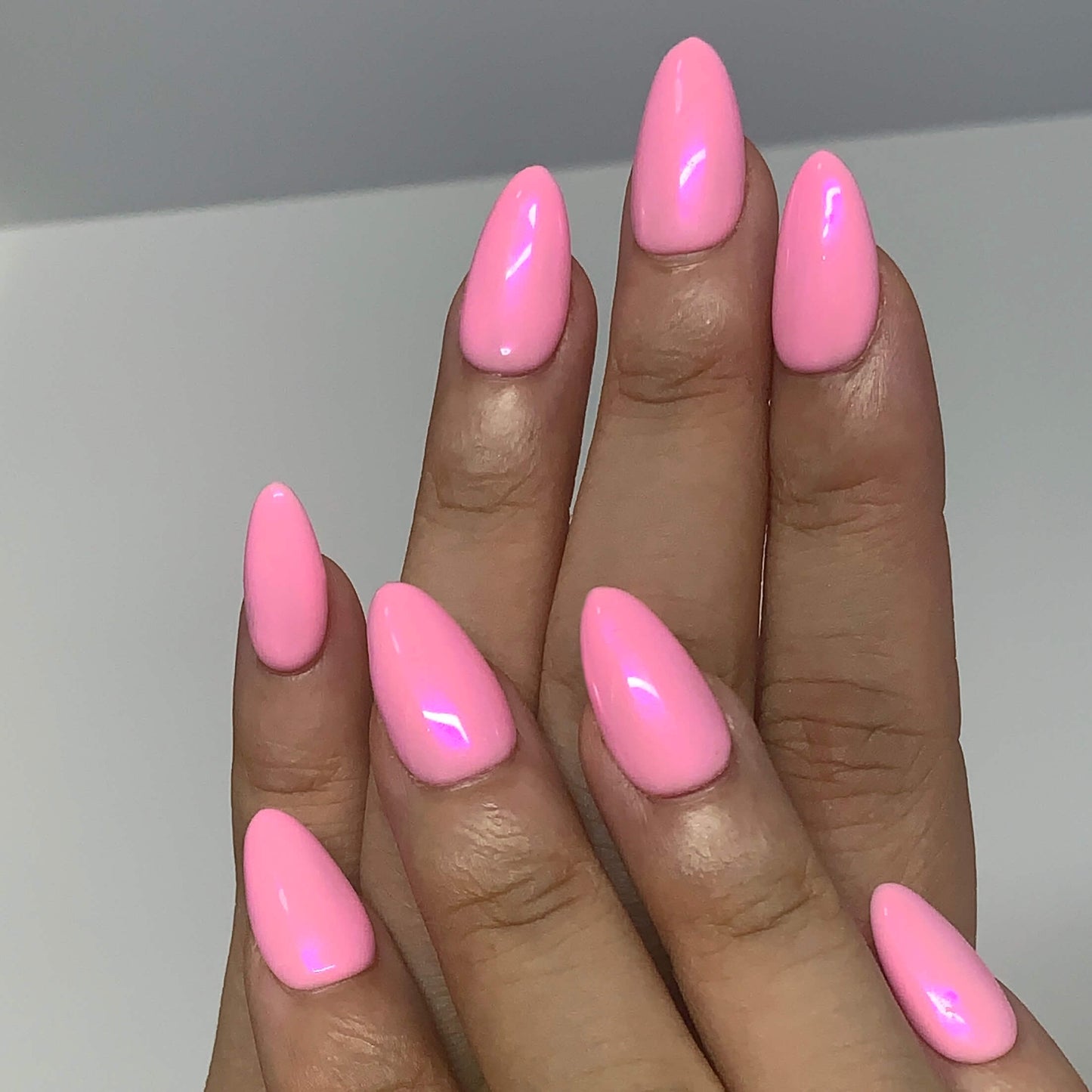 Front view of both hands with Pearl Glaze Cotton Candy press-on nails, smooth pink pearl tone and clean manicure style.