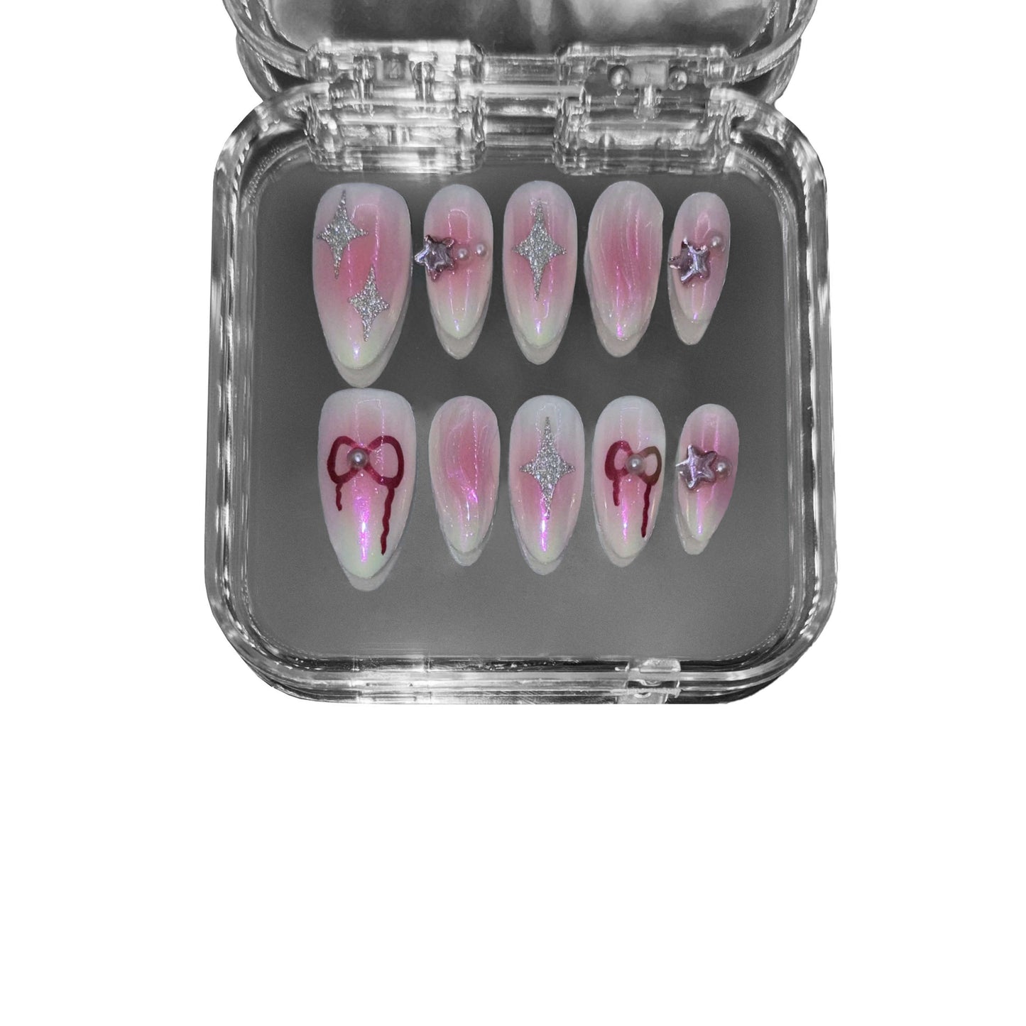 "Celestial Bow" – a pink aura almond-shaped press-on nail set featuring iridescent shimmer, silver stars, 3D ribbons, and transparent water ripple textures for a dreamy, futuristic Y2K aesthetic.
