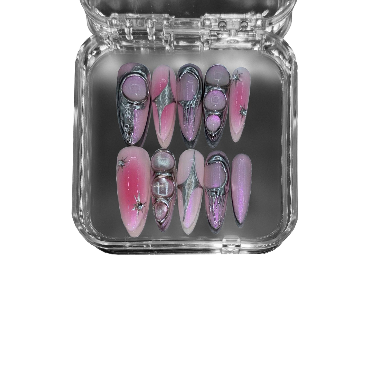 Cosmic Bloom" – a metallic pink stiletto press-on nail set featuring an aura gradient, soft blush airbrush effect, liquid metal details, and reflective starbursts for a high-end, salon-quality manicure.