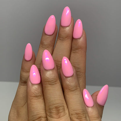 Pearl Glaze Cotton Candy press-on nails shown on both hands, soft pink pearl finish with almond shape.