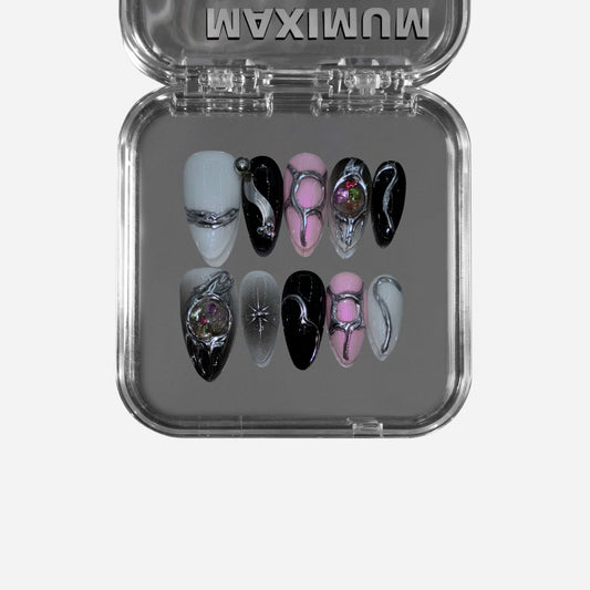  "Astral Phantom" – a black & pink almond-shaped press-on nail set featuring sculptural metallic elements, 3D glass spheres, and fluid futuristic detailing for an avant-garde cosmic aesthetic.