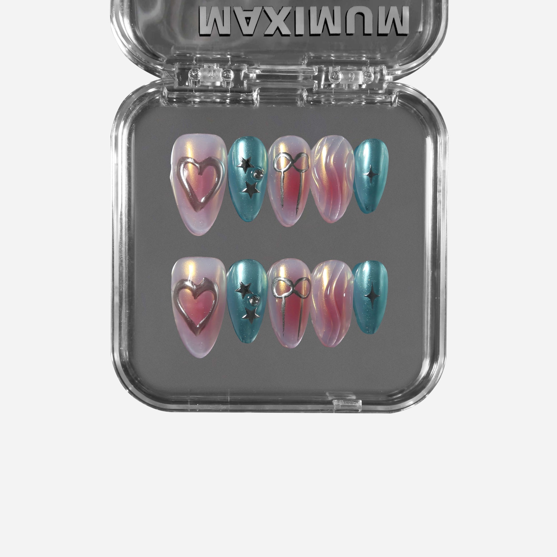 Long almond press-on nails with aurora powder finish, water ripple textures, 3D hearts, bows, and iridescent details for a dreamy coquette look.