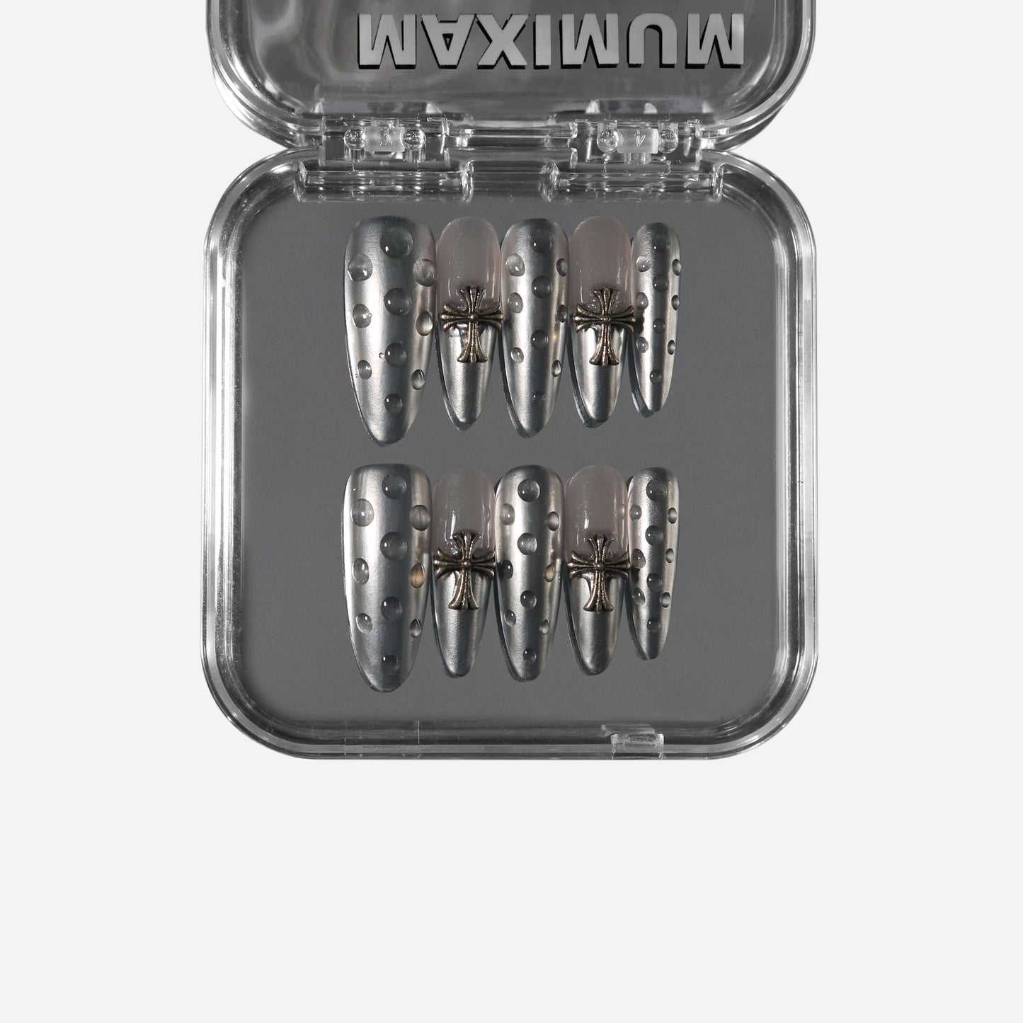 Almond press-on nails in reflective chrome with small metallic studs, handmade and reusable.