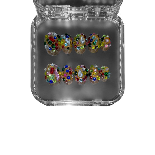 Jíbaro – a gold-embellished short round 3D press-on nail set featuring gemstone inlays and intricate detailing for a luxurious, high-fashion look.