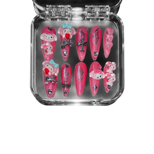  "Neon Banshee" – Pink stiletto 3D press-on nails featuring gothic crosses, 3D kawaii teddy bears, and cyber Y2K-inspired embellishments.