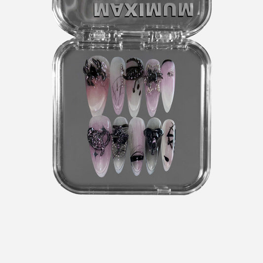 "Soirée of the Widow" – a black stiletto-shaped press-on nail set featuring gothic lace patterns, metallic spiders, and a seductive dark-to-light gradient for a luxurious gothic aesthetic.