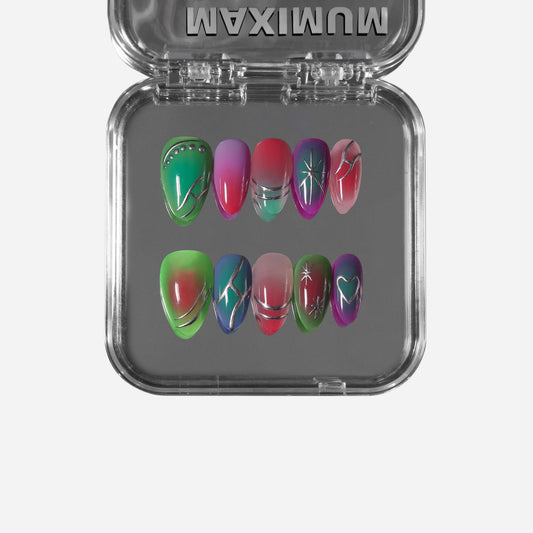 Almond press-on nails with fruity green-pink-purple gradient, metallic star and line accents, and playful Y2K-inspired design.