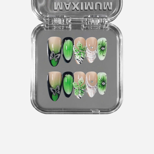 Verdantia almond press-on nails with airbrushed green gradient, butterfly and floral accents, and waterdrop detail.